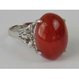 A Carnelian cabachon ring in high-corone