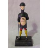 A Guinness money box, 'Good for him and