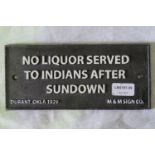 A cast metal sign 'No Liquor Served to I