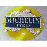 A Michelin tyres oval sign, 30 x 26cm