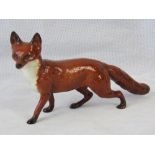 A Beswick figure of a large stalking fox