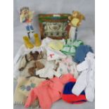 A collection of dolls clothing together