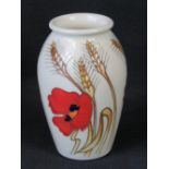 A Moorcroft vase with Harvest Poppy desi