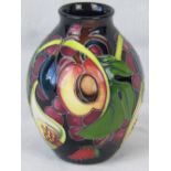 A Moorcraft vase with Queens Choice desi