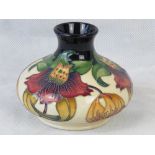 A Moorcroft vase with Anna Lily design b