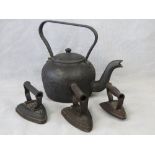 A large and heavy cast kettle with lid a