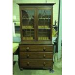 An Edwardian mahogany bookcase on chest,