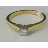 An 18ct gold diamond solitaire ring, 0.