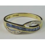 A 9ct gold sapphire and diamond crossover design ring,