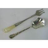 Two HM silver items; a pickle fork of trident form with mother of pearl handle, Birmingham 1909,