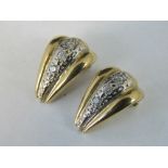 A pair of 9ct gold and diamond clip on earrings,