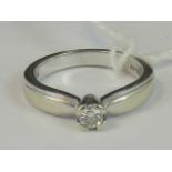 A 14ct white gold and diamond solitaire ring, approx 0.15ct, stamped 14k Mex, size I, 3.