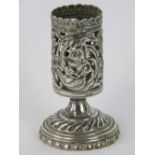 An HM silver Birmingham made late 19th pierced candle holder with footed vase, 8cm high. 1.64oz.