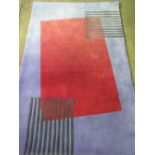 A contemporary playground rug having read offset central panel and measuring 185 x 120cm. AF.