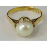 A Chinese 18ct gold and pearl ring,