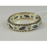 A 9ct gold sapphire and white stone eternity ring,