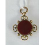 A 9ct gold fob set with bloodstone and agate, hallmarked 375, 3cm long, 3.