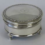 A HM silver trinket box, velvet lining, standing on three cast cabriole legs, Sheffield 1921,