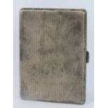 A HM silver cigarette case, elastic in good condition, Birmingham 1945, maker Adie Brothers,