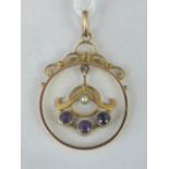 A 9ct gold seed pearl and amethyst pendant, bale stamped 9c, 3.4cm long, 1.86g.