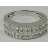 A 10ct white gold diamond encrusted half eternity band.