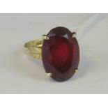 A large and impressive 14ct gold garnet ring,