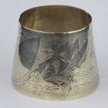 A pale yellow metal conical cuff bangle, stamped 9ct, engraved with floral pattern, 45.35g, 4.