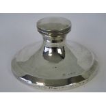 A HM silver capstan inkwell (hinge a/f, liner deficient), wooden base, Birmingham 1921,