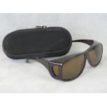 A pair of Cocoon Polaroid fishermans sunglasses in original case. As new.