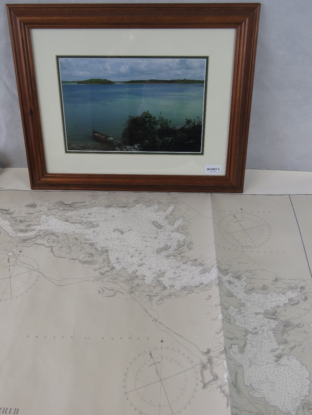 A 1995 map of Loughs Corrib & Mask together with a framed photograph of Lough Carra. Two items.