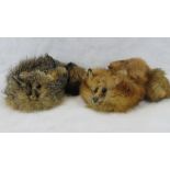 Two fox fur hats.