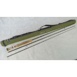 A modern Greys Platinum XD 10'7" fly fishing rod with padded cylindrical case.
