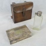 A 19th C leather hunting canteen with plated hunting cake tin and glass flask. 14cm wide.