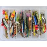 Around sixty assorted spinners and plugs for Pike & Salmon in six-sectional box.