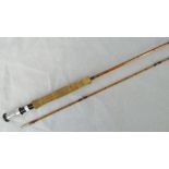 A vintage "Perfection", 8' 6" split cane fly rod, serial number 'H71856'.