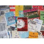 Over 40 football programmes from 1950s - 1970s featuring Manchester City, Queens Park Rangers,