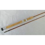 A vintage 6' split cane spinning rod, possibly an Allcock 'Palace' rod, label indistinct.