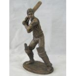 A composite Sherratt & Simpson figurine of a "Cricketer swinging the bat"; overall height 27cm.