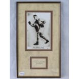 A photographic print of the boxer Jack Dempsey with a separate autograph,