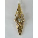 A 15ct gold and diamond pendant, central