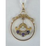 A 9ct gold seed pearl and amethyst penda