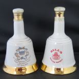 Two Wade commemorative whisky bells date