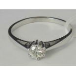 A 9ct white gold diamond solitaire ring,