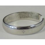 A 9ct white gold and diamond band, diamo