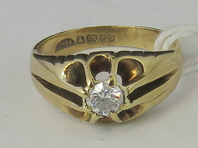 A 9ct gold and diamond gypsy ring, diamo