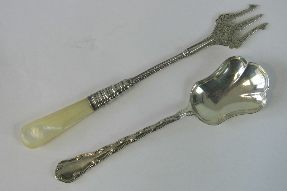 Two HM silver items; a pickle fork of tr