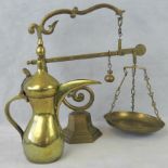 An ornate brass set of scales stamped "1