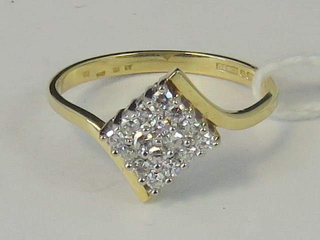 An 18ct gold diamond cluster ring, squar