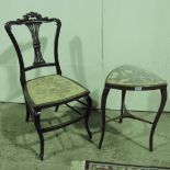 A lyre back chair with upholstered seat