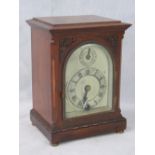 A small mahogany cased mantle clock by H